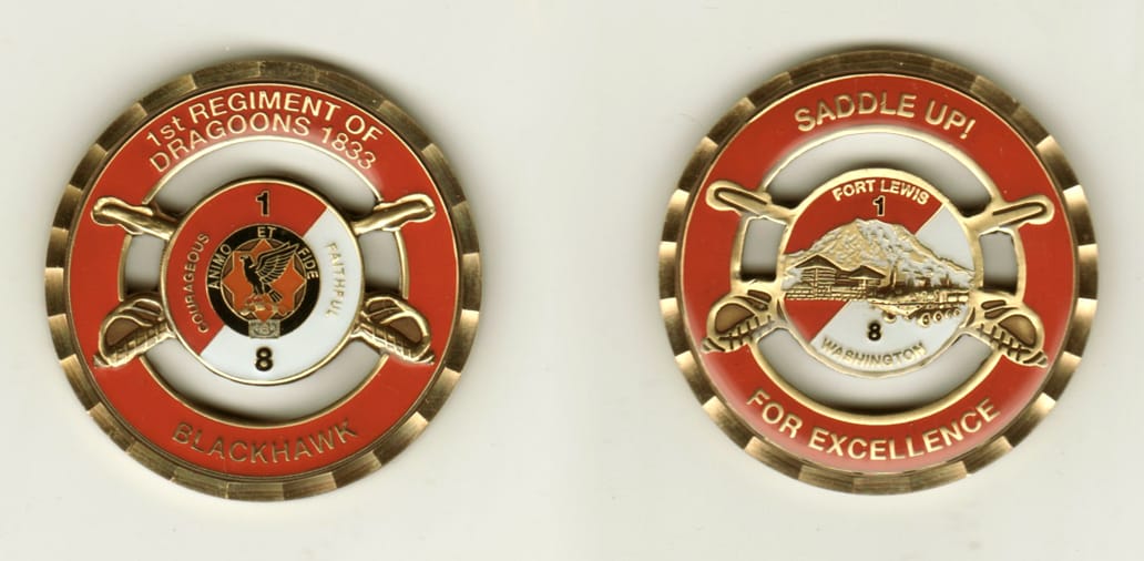 Round shaped, brass colored coin, 1 7/8 inches in diameter.