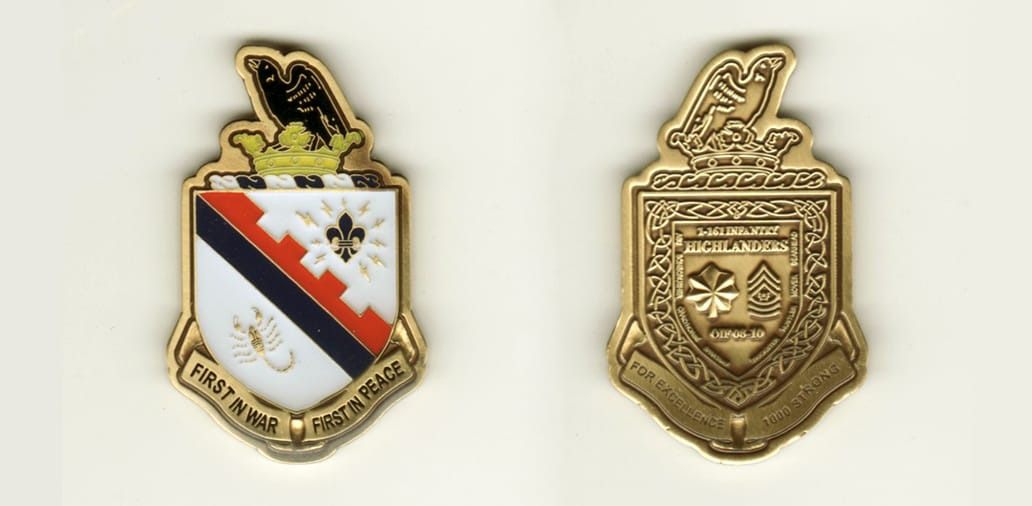 Shield shaped, with banner mounted below and crow perched on crown mounted above, brass colored coin, 1 1/4 inches wide ...