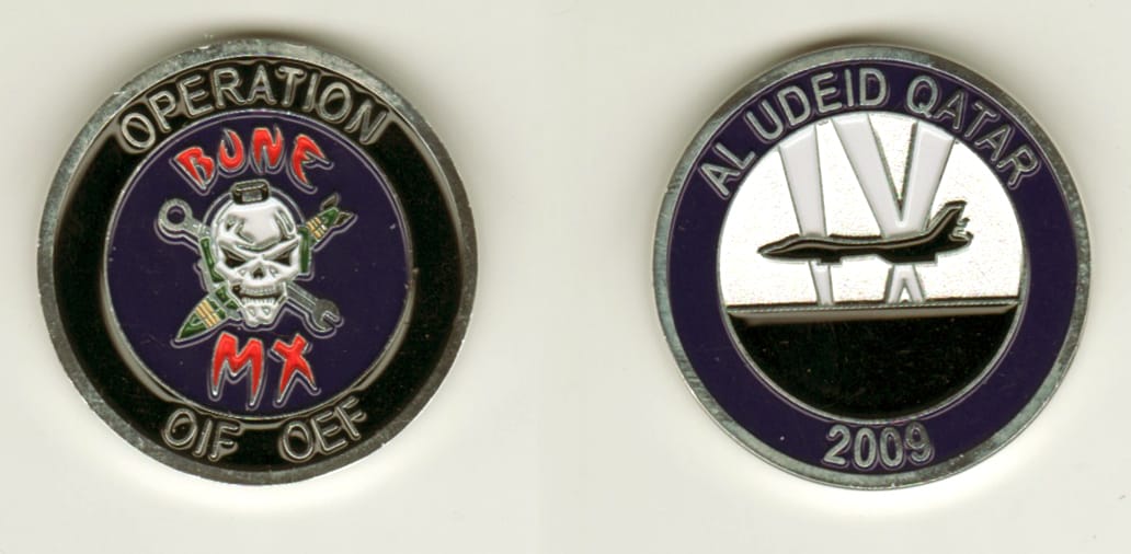 Round shaped, silver colored coin, 1 1/4 inches in diameter.