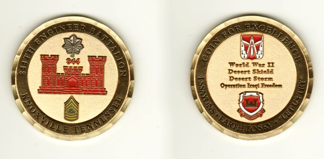 Round shaped, brass colored coin, 2 inches in diameter.