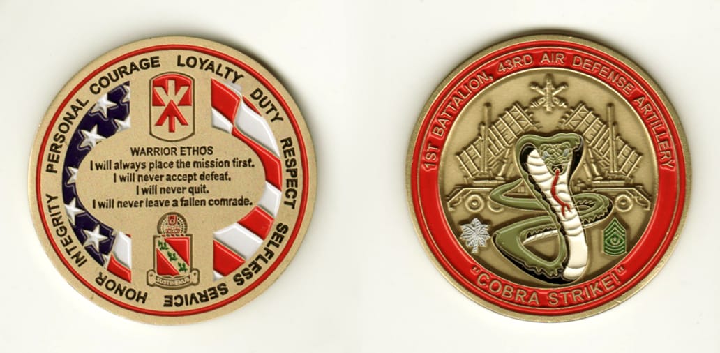 Round shaped, brass colored coin, 2 inches in diameter.