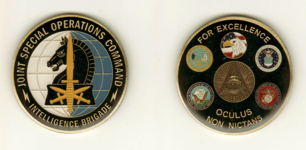 Round shaped, gold colored coin, 2 inches in diameter.