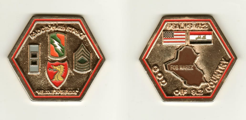 Hexagon shaped, gold colored coin, 2 1/8 inches wide x 2 1/8 inches high.