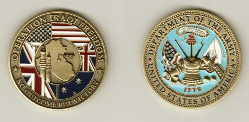 Round shaped, brass colored coin, 1 11/16 inches in diameter.