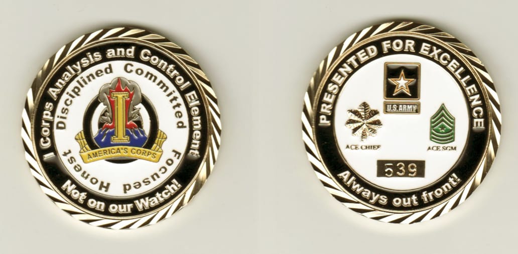 Round shaped, gold colored coin, 1-5/8 inches in diameter.