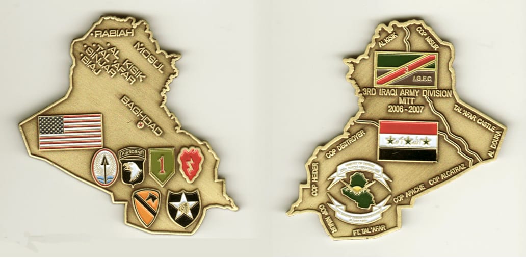 Iraq shaped, brass colored coin, 2-1/2 inches wide x 2-3/4 inches high.