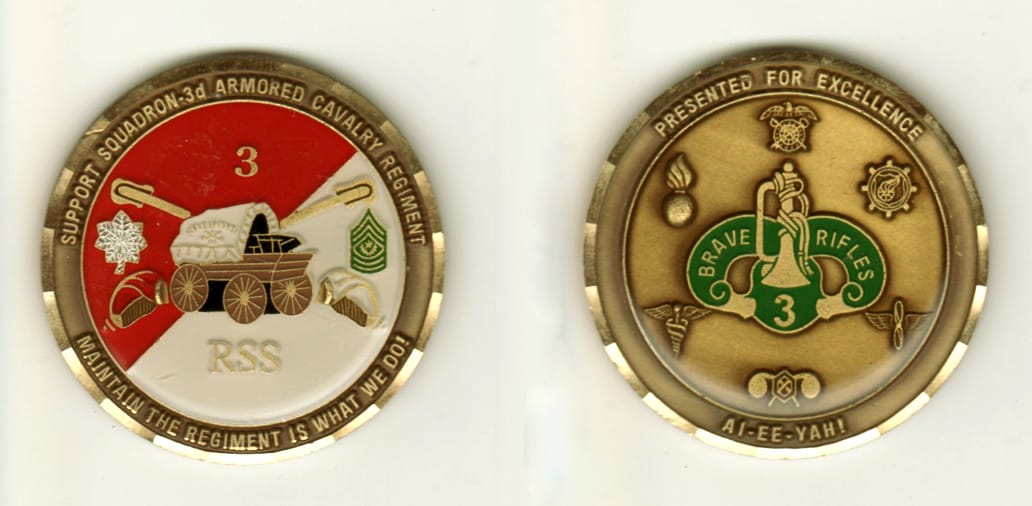 Round shaped, brass colored coin, 2 inches in diameter.