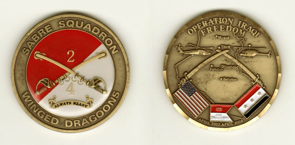 Round shaped, brass colored coin, 2 inches in diameter.