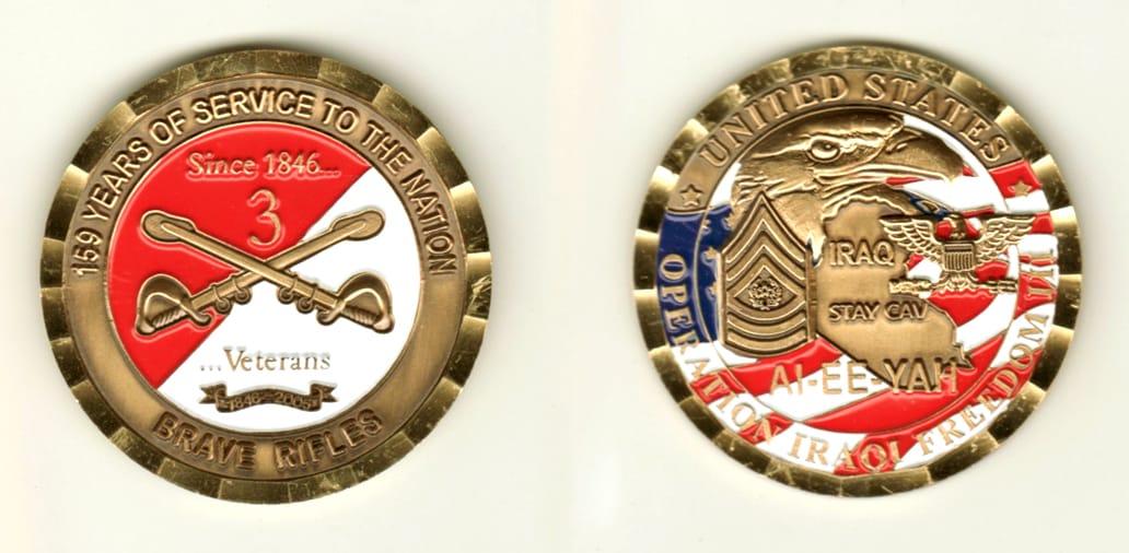 Round shaped, brass colored coin, 2 inches in diameter.