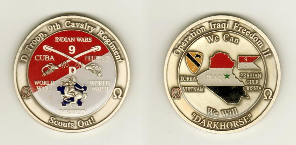 Round shaped, pewter colored coin, 2 inches in diameter.