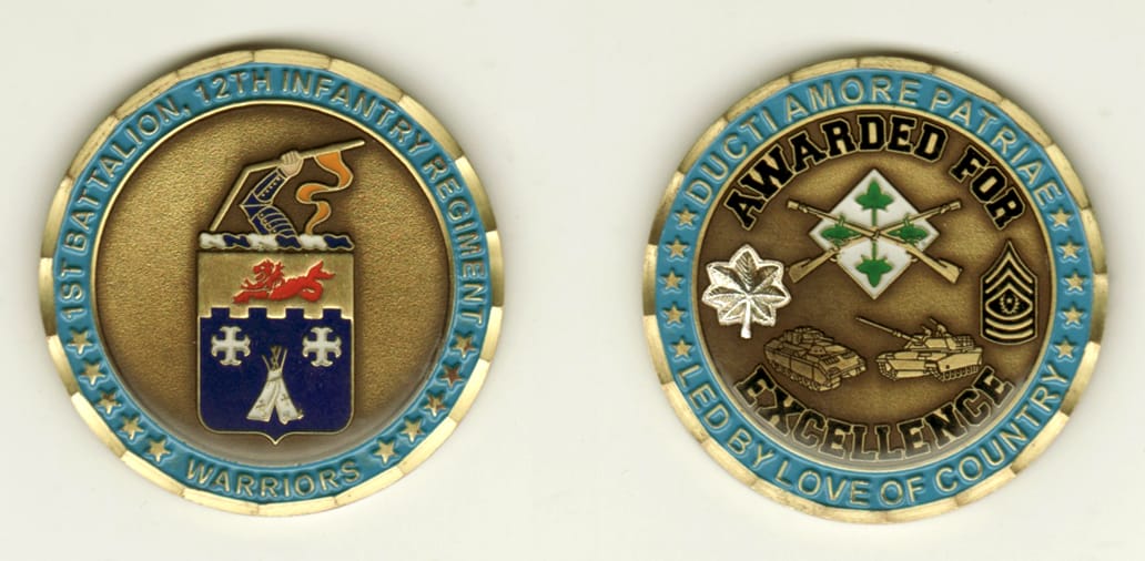 Round shaped, brass colored coin, 2 inches in diameter.