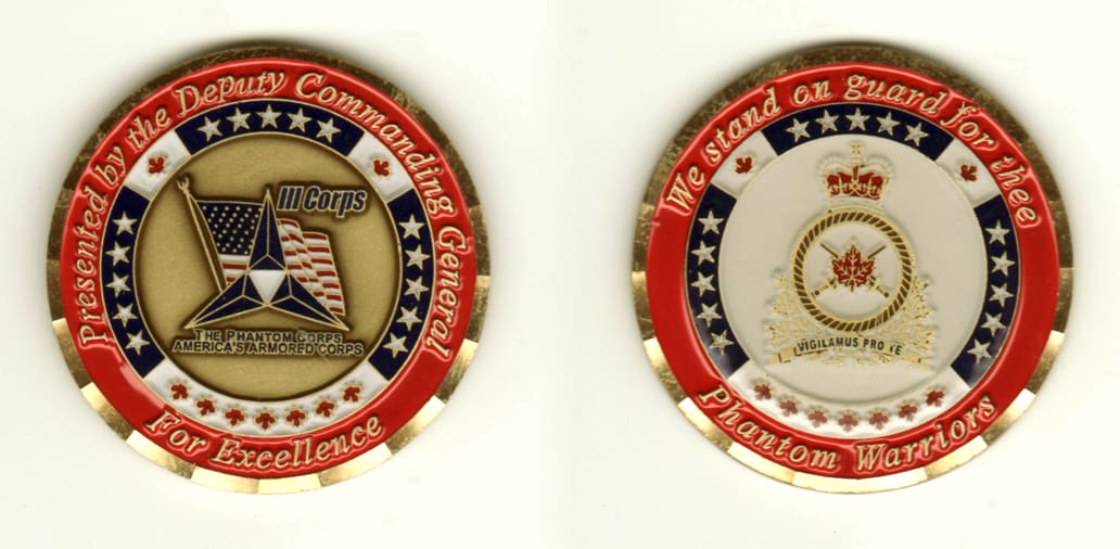 Round shaped, brass colored coin, 2 inches in diameter.