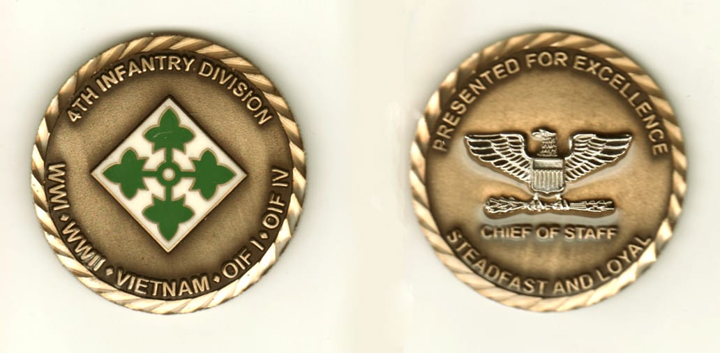 Round shaped, brass colored coin, 2 inches in diameter.