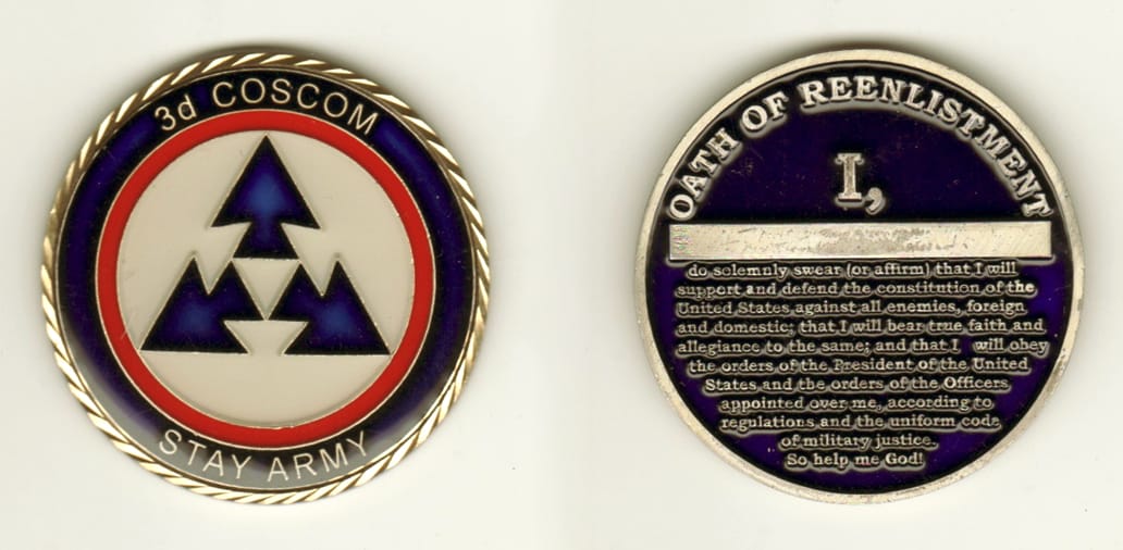 Round shaped, silver colored coin, 2 inches in diameter.