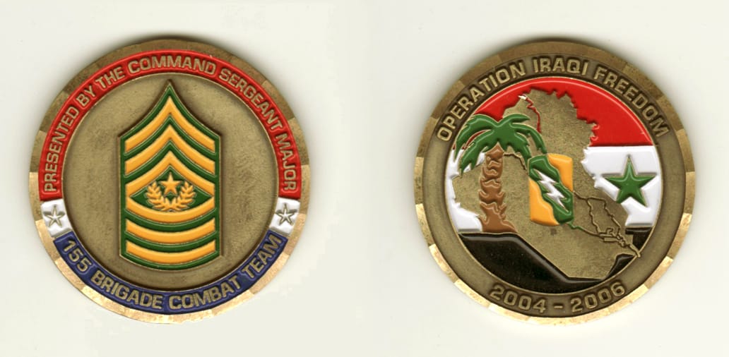 Round shaped, brass colored coin, 2 inches in diameter.