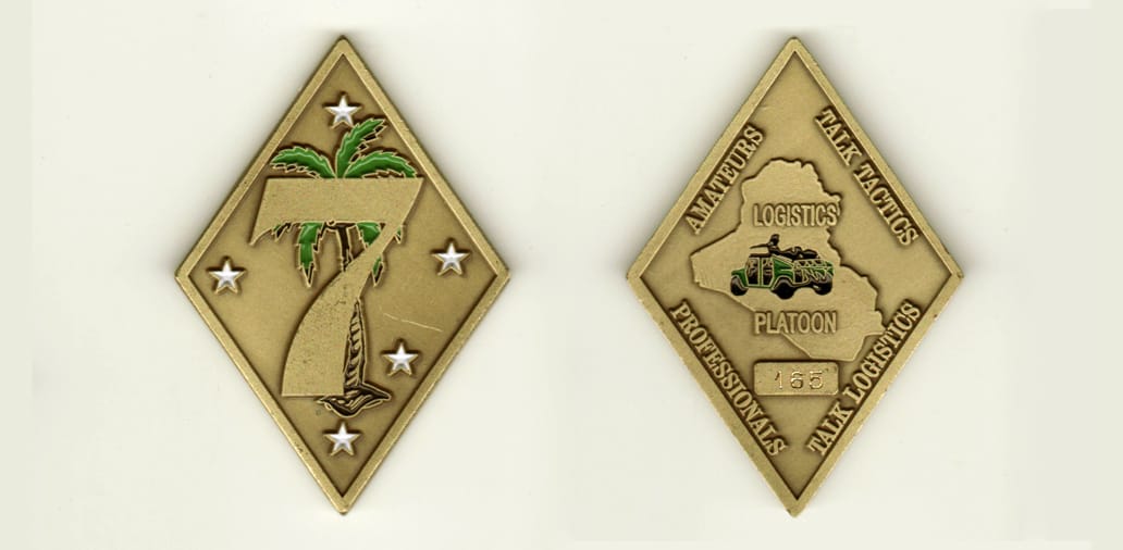 Elongated diamond shaped, brass colored coin, 2-1/2 inches wide  by 1-3/4 inches high.