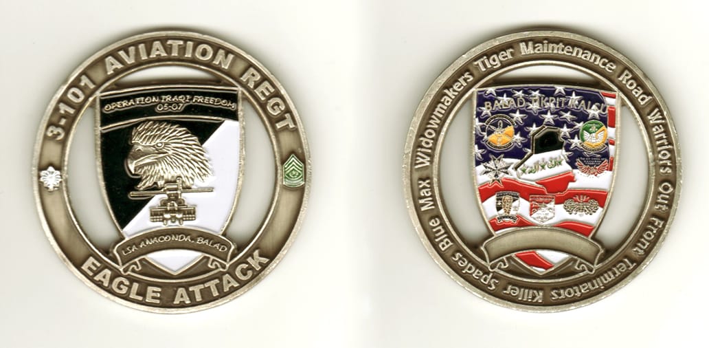 Round shaped, pewter colored coin, 2-1/2 inches in diameter.