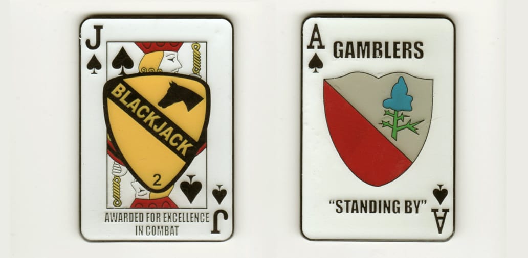 Retangular playing card shaped, enameled colored coin , 1-3/48 inches wide x 2-1/2 inches high.