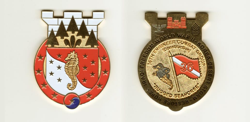 Round shaped with Engineer castle protuding from top,  gold colored coin, 2 inches wide x 2-1/2 inches high.