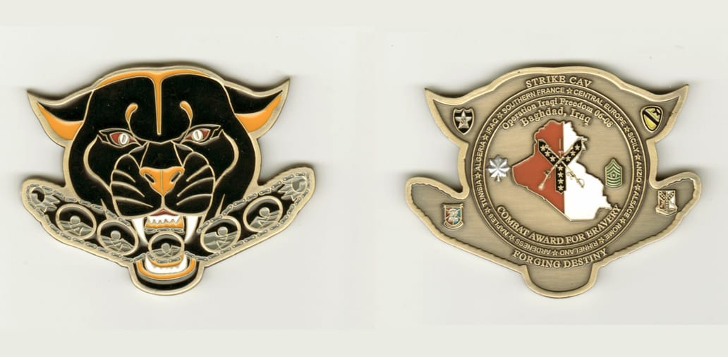 Panther head shaped with crushed tank tracks protuding on both sides of the mouth, antique brass colored coin, 2-3/4 inc...