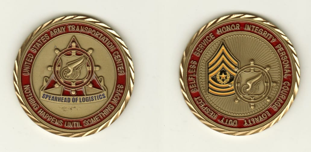 Round shaped, brass colored coin, 2 inches in diameter.