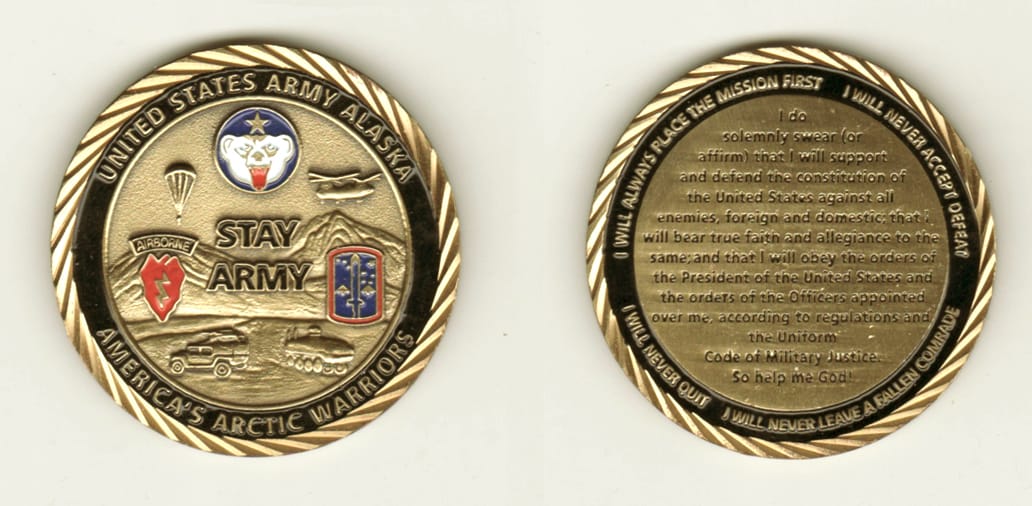 Round shaped, antique brass colored coin, 2 inches in diameter.