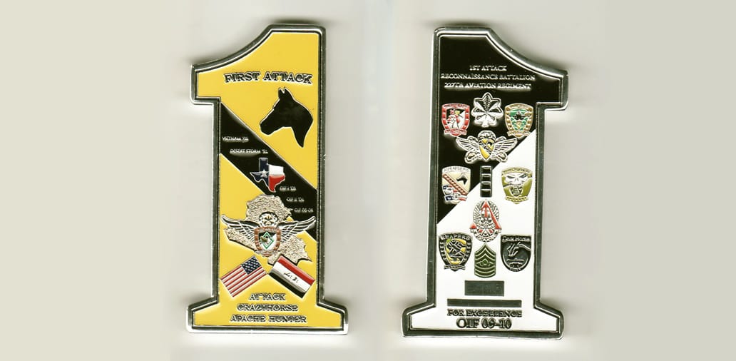 Number one shaped, silver colored coin, 3 inches high x 1 inch wide