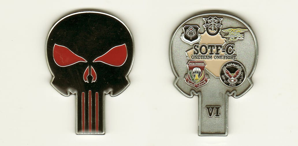 Skull shaped,  pewter colored coin, 2 inches high x 1 1/2 inches wide