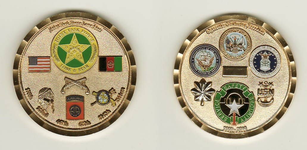 Round shaped, gold colored coin, 2 inches in diameter.