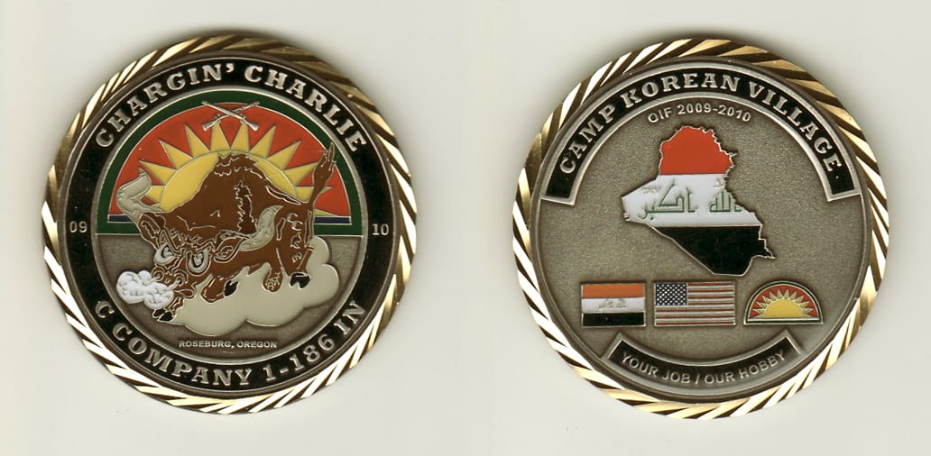 Round shaped, pewter colored coin, 2 inches in diameter.