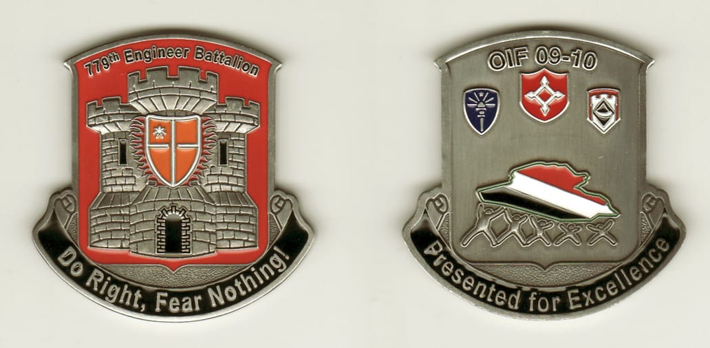 Squared shield shaped,  with bowed top and banner mounted beneath, pewter colored coin, 2 inches high x 2 inches wide