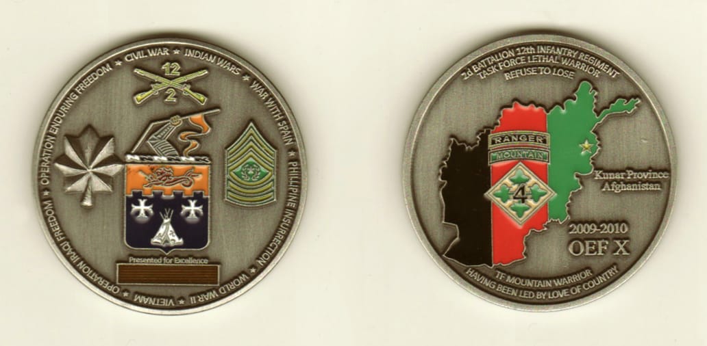 Round shaped, pewter colored coin, 1-5/8 inches in diameter.