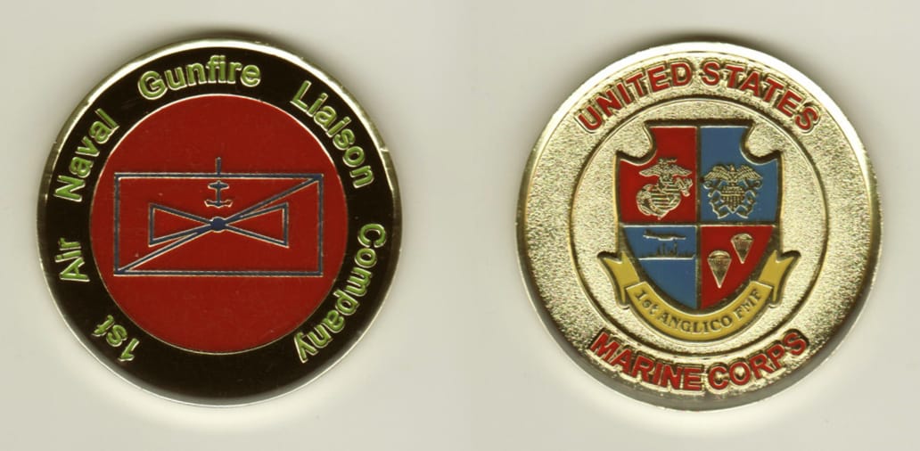 Round shaped, gold colored coin, 1-3/4 inches in diameter.