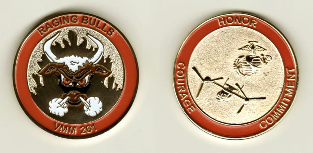 Round shaped, gold colored coin, 1-5/8 inches in diameter.