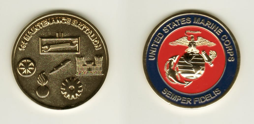 Round shaped, gold colored coin, 1-3/4 inches in diameter.