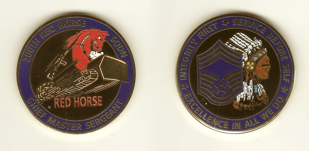 Round shaped, gold colored coin, 1-5/8 inches in diameter.