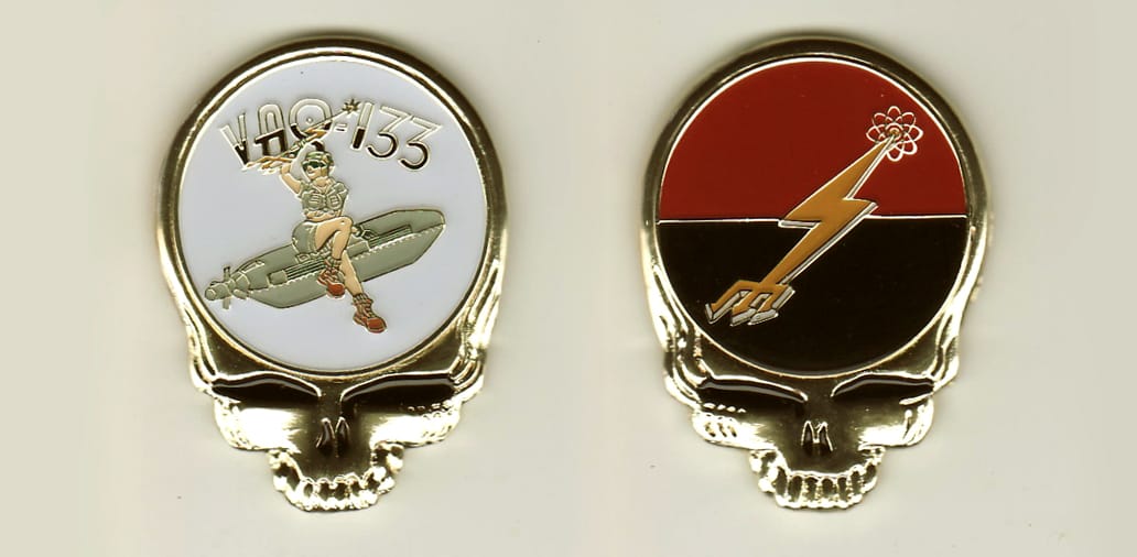 Skull shaped, gold colored coin, 1-1/4inches wide x 1-3/4 inches high.