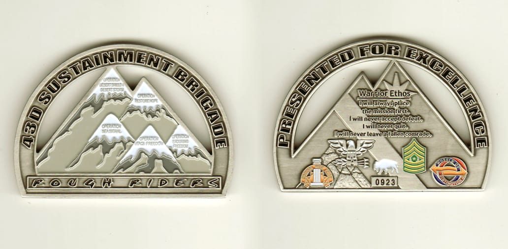 Half Circle shaped, pewtercolored coin, 2-1/2 inches wide x 1-3/4 inches high.