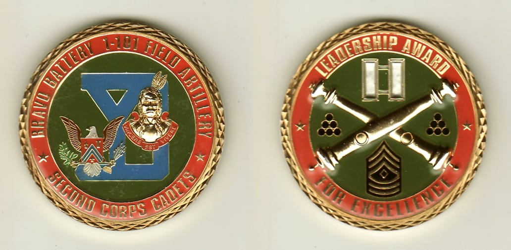 Round shaped, brass colored coin, 1-3/4 inches in diameter.