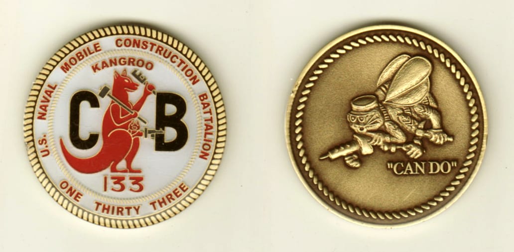 Round shaped, brass colored coin, 1-1/2 inches in diameter.