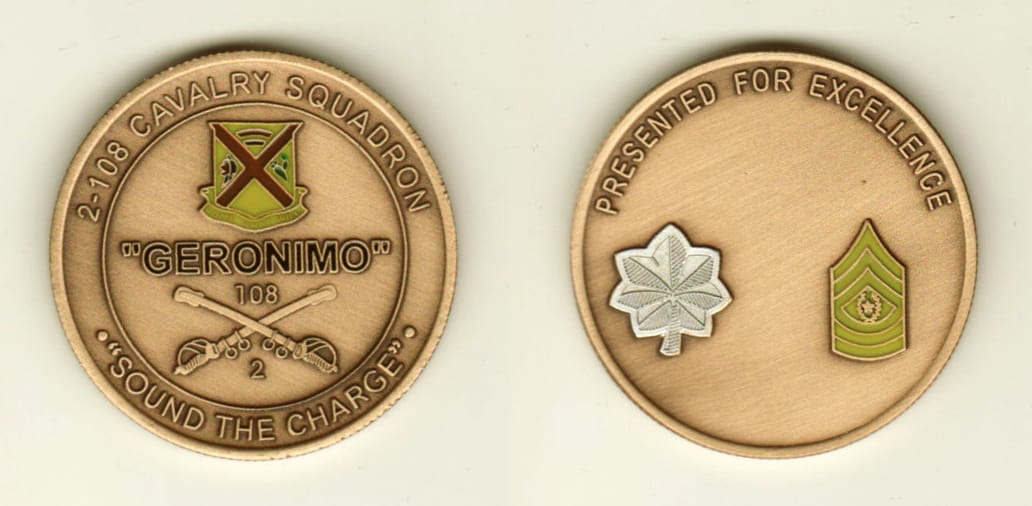 Round shaped, brass colored coin, 1-1/2 inches in diameter.