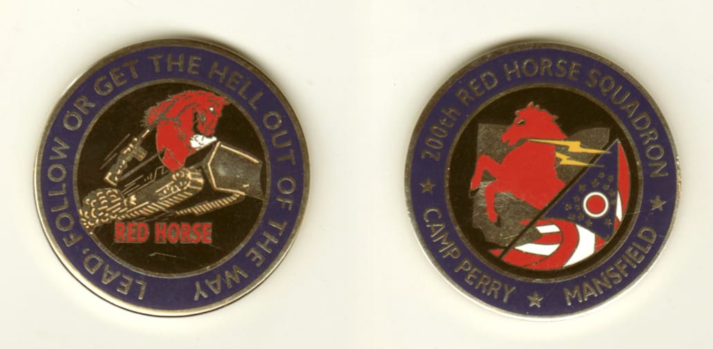 Round shaped, gold colored coin, 1-1/2 inches in diameter.