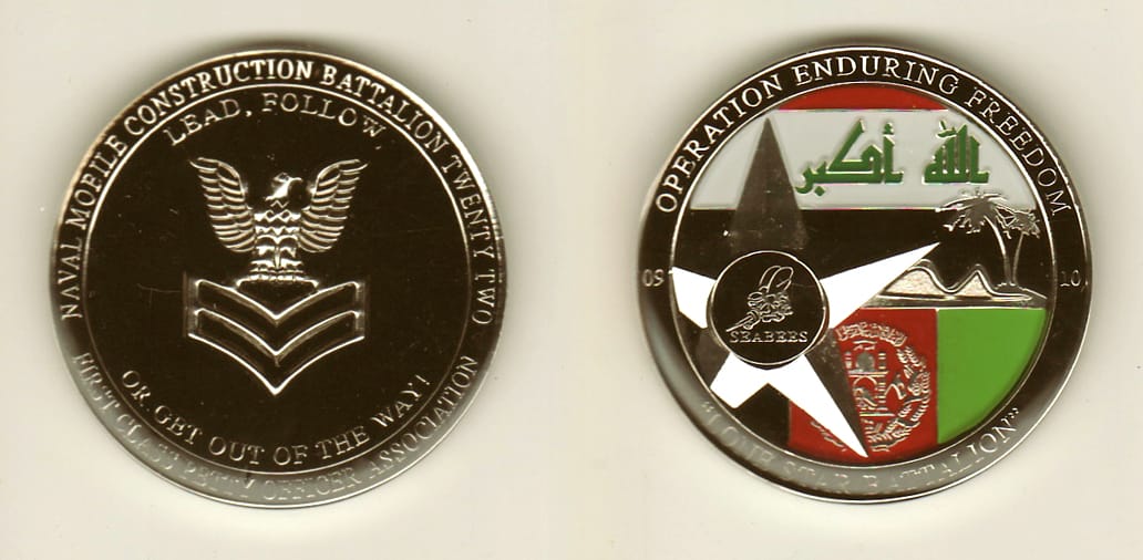 Round shaped, silver colored coin, 1-1/2 inches in diameter.