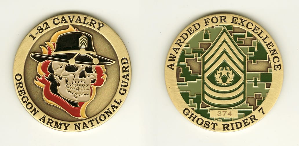 Round shaped, brass colored coin, 2 inches in diameter.