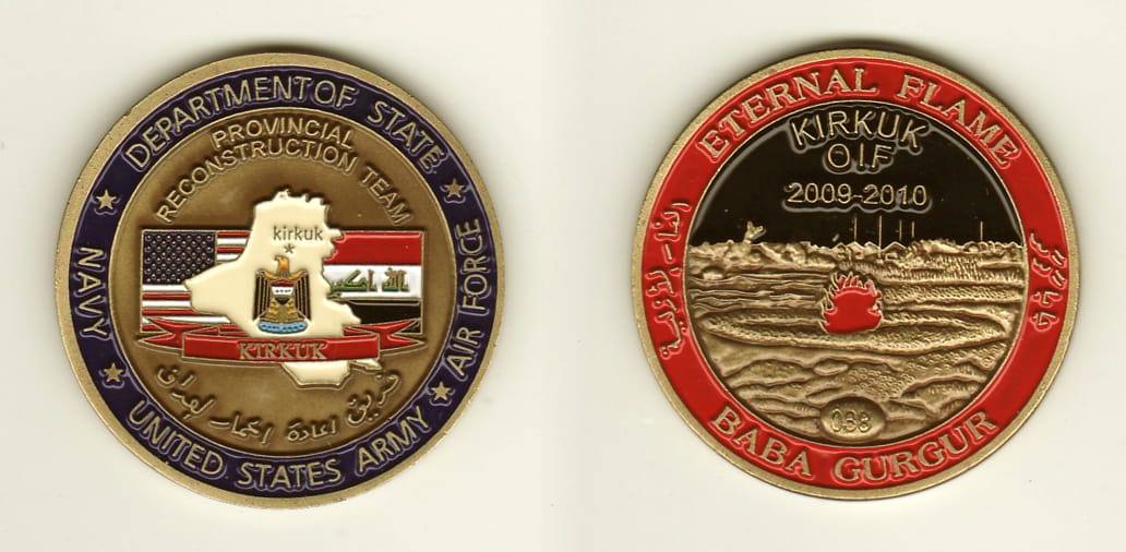 Round shaped, brass colored coin, 2 inches in diameter.