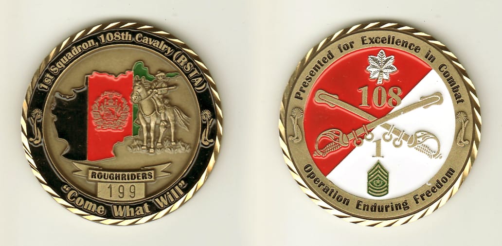 Round shaped, brass colored coin, 2 inches in diameter.