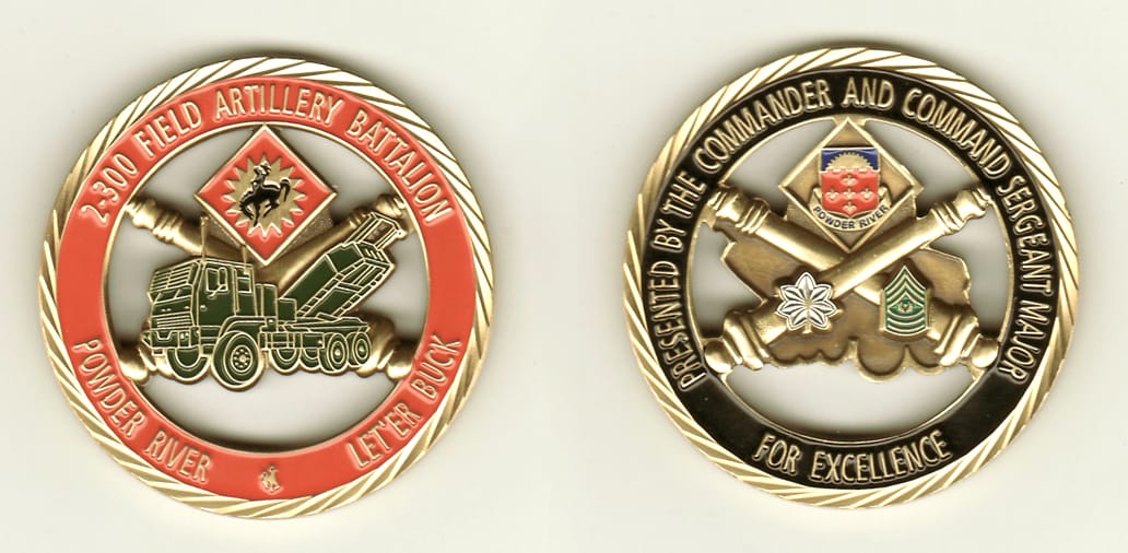 Round shaped, brass colored coin, 2 inches in diameter.