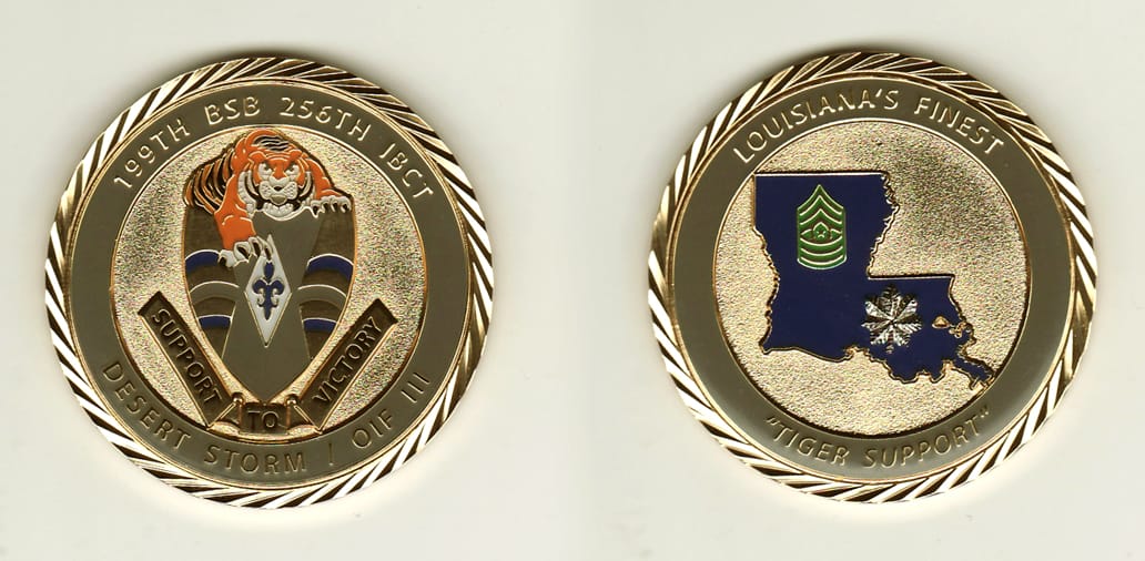 Round shaped, gold colored coin, 2 inches in diameter.