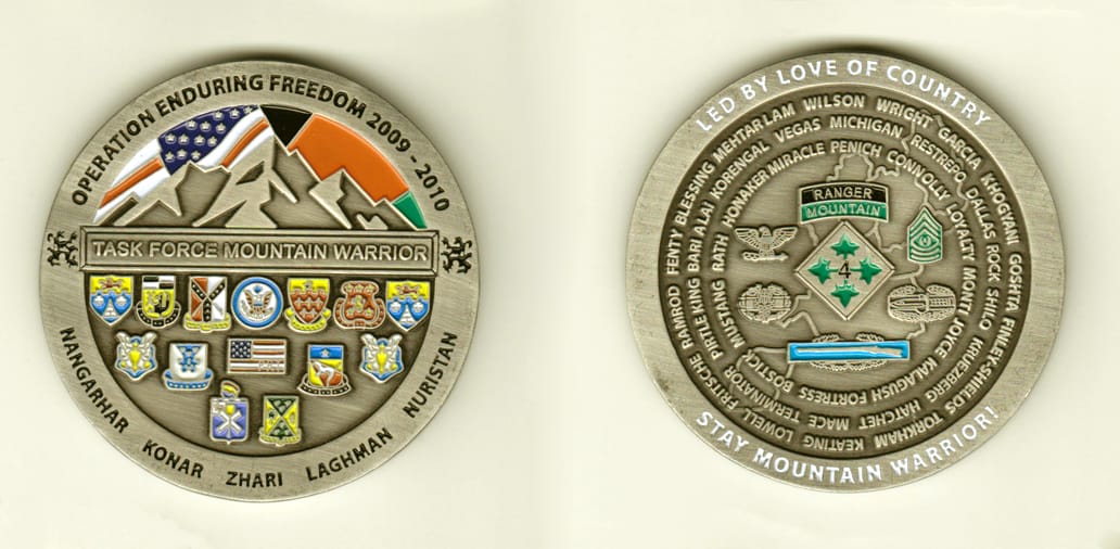 Round shaped, pewter colored coin, 2-7/16 inches in diameter.