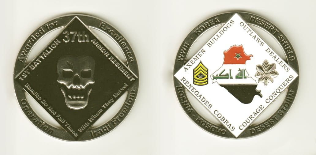 Round shaped, silver colored coin, 2-1/2 inches in diameter.